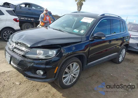 2014 Volkswagen Tiguan Sel z USA, uszkodzony, nr VIN WVGAV3AX4EW578234